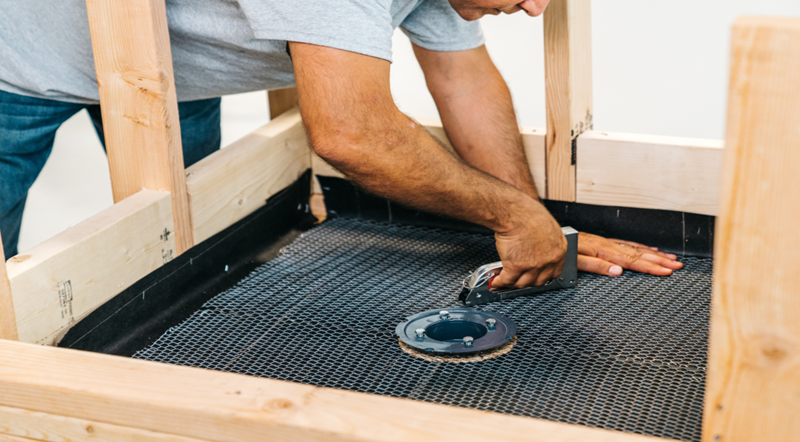 man using staple gun