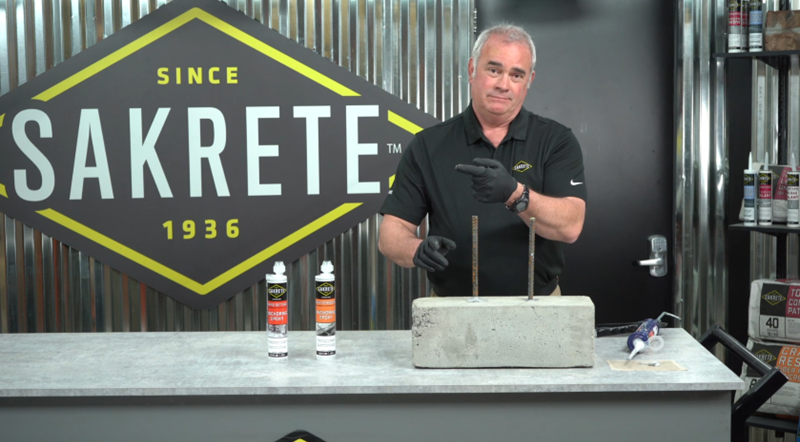 Man demonstrating anchor rebar into concrete repair